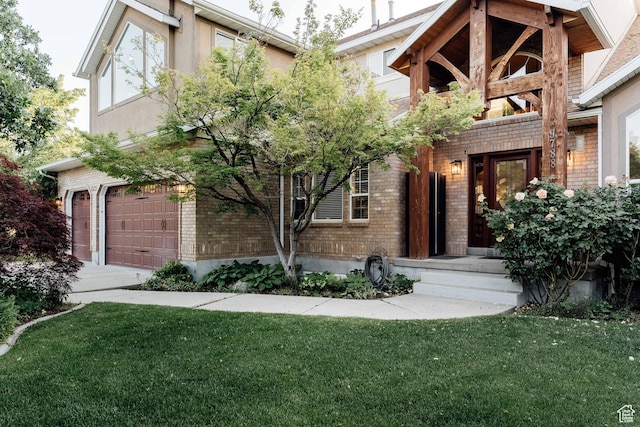 9788 S Dante Rd E, Sandy, UT 84092 - view of front facade with brick siding, a front yard, and a garage