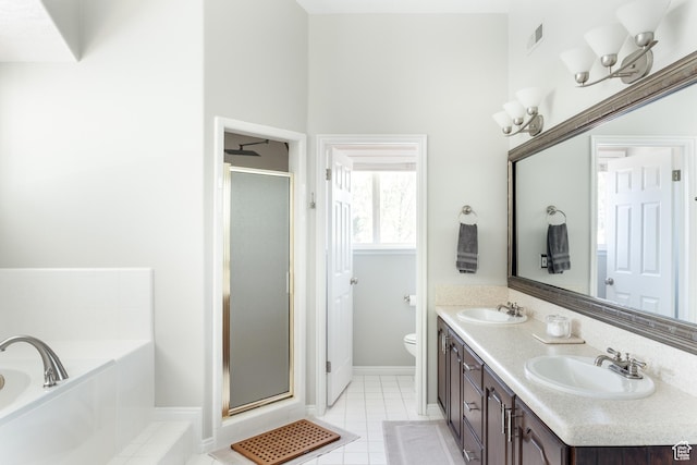 9788 S Dante Rd E, Sandy, UT 84092 - full bath featuring a stall shower, a garden tub, double vanity, and tile patterned flooring