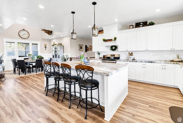 2253 N 1200 E, Monroe, UT 84754 - kitchen with a kitchen island, light wood-type flooring, white cabinets, and recessed lighting