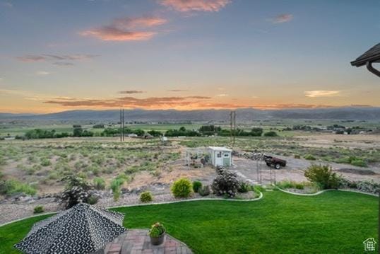 2253 N 1200 E, Monroe, UT 84754 - yard at dusk with a lawn