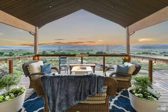 2253 N 1200 E, Monroe, UT 84754 - view of wooden balcony with an outdoor living space with a fire pit and a wooden deck