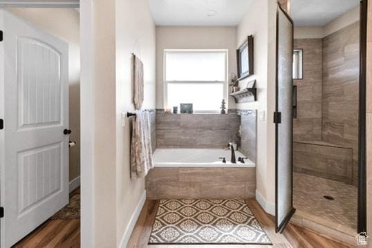 2253 N 1200 E, Monroe, UT 84754 - full bath featuring a garden tub, wood finished floors, and walk in shower