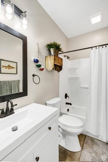 2253 N 1200 E, Monroe, UT 84754 - full bath with vanity, wood finished floors, and shower / bath combination with curtain