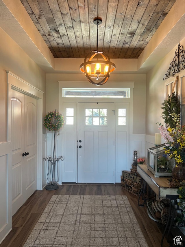 2253 N 1200 E, Monroe, UT 84754 - foyer featuring wood ceiling, a wainscoted wall, dark wood-type flooring, a chandelier, and a decorative wall