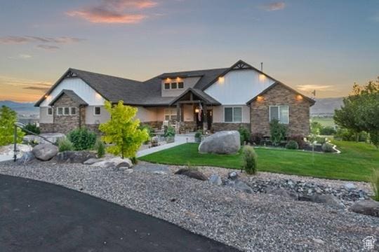 2253 N 1200 E, Monroe, UT 84754 - view of front facade featuring stone siding and a lawn