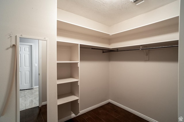 3524 S Price Hills Dr, St George, UT 84790 - walk in closet with dark wood-style floors