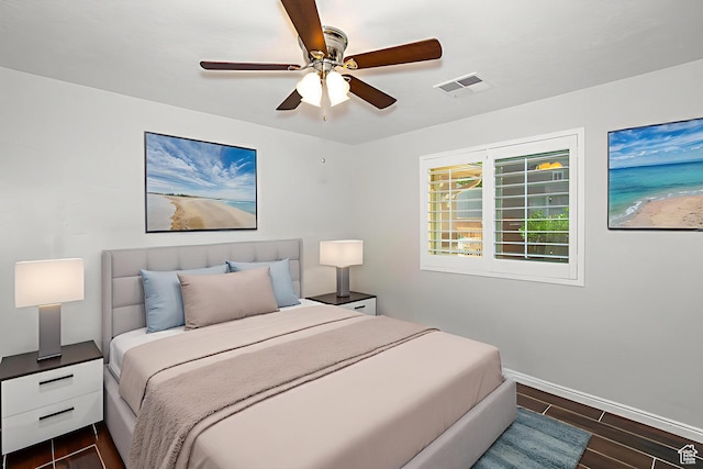 3524 S Price Hills Dr, St George, UT 84790 - bedroom with dark wood-style flooring and a ceiling fan