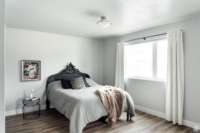 736 S 300 E Unit 1A, Salt Lake City, UT 84111 - bedroom with wood finished floors and a textured ceiling