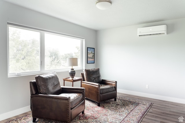 736 S 300 E Unit 1A, Salt Lake City, UT 84111 - living area with an AC wall unit and wood finished floors