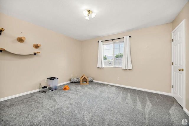 162 W 1275 S Unit 162, Logan, UT 84321 - unfurnished room featuring carpet floors and baseboards