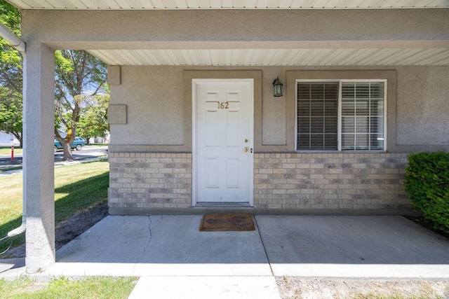 162 W 1275 S Unit 162, Logan, UT 84321 - entrance to property featuring stucco siding and brick siding