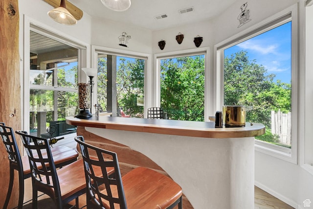 1269 Alice Ln, Farmington, UT 84025 - sunroom / solarium with baseboards and wood finished floors