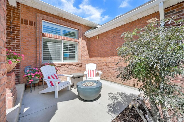1269 Alice Ln, Farmington, UT 84025 - view of patio / terrace featuring a fire pit