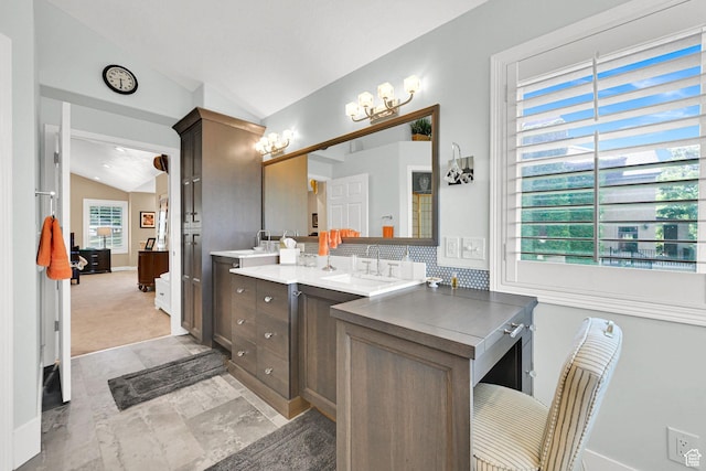 1269 Alice Ln, Farmington, UT 84025 - full bathroom with lofted ceiling, a chandelier, double vanity, and tasteful backsplash