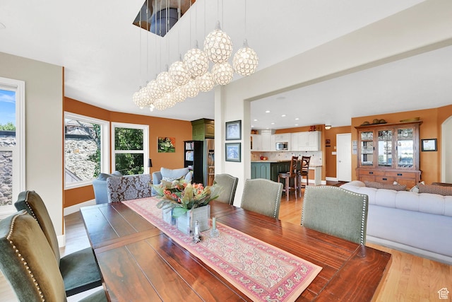1269 Alice Ln, Farmington, UT 84025 - dining room featuring light wood-style flooring, recessed lighting, and a chandelier