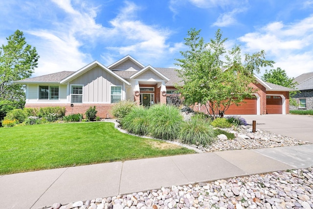 1269 Alice Ln, Farmington, UT 84025 - view of front facade with board and batten siding, brick siding, a garage, driveway, and a front lawn