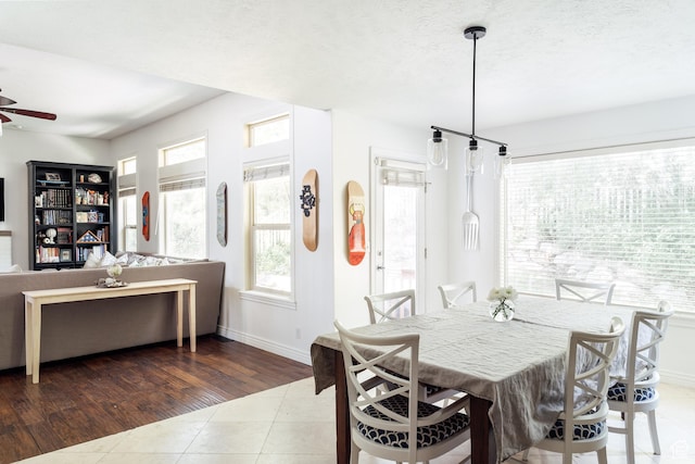 3551 S Huntington Dr, Bountiful, UT 84010 - tiled dining space featuring baseboards and ceiling fan