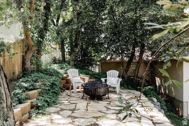 3551 S Huntington Dr, Bountiful, UT 84010 - view of patio / terrace with a fire pit