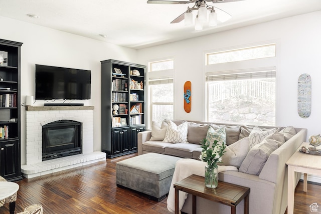 3551 S Huntington Dr, Bountiful, UT 84010 - living room featuring a ceiling fan, dark wood-style floors, and a fireplace