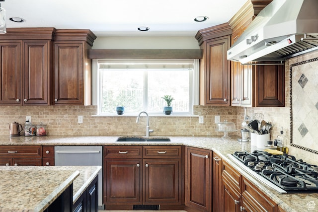 3551 S Huntington Dr, Bountiful, UT 84010 - kitchen featuring wall chimney exhaust hood, gas stovetop, tasteful backsplash, and light stone countertops