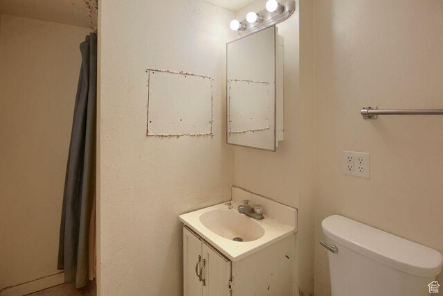 2266 W Arches Dr, Taylorsville, UT 84129 - bathroom with vanity and toilet