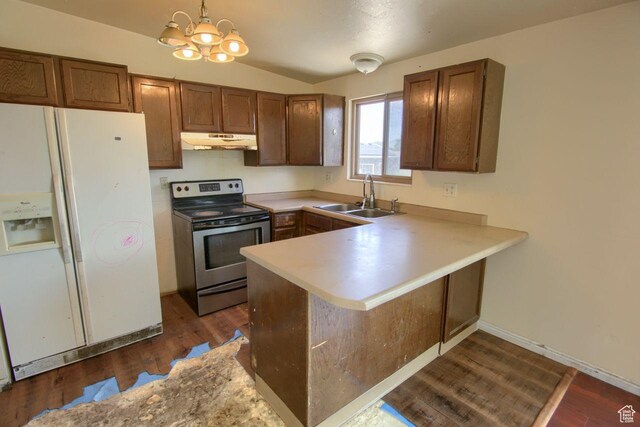 2266 W Arches Dr, Taylorsville, UT 84129 - kitchen with white fridge with ice dispenser, stainless steel electric stove, under cabinet range hood, a peninsula, and dark wood-style flooring