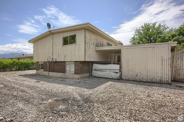 2266 W Arches Dr, Taylorsville, UT 84129 - view of property exterior with brick siding