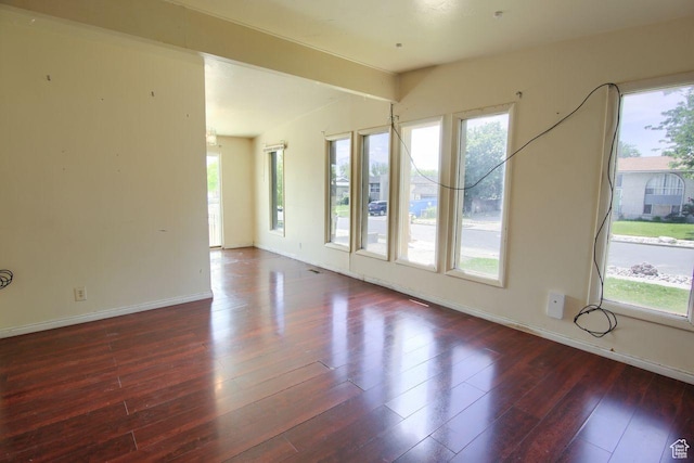 2266 W Arches Dr, Taylorsville, UT 84129 - empty room featuring wood finished floors and baseboards