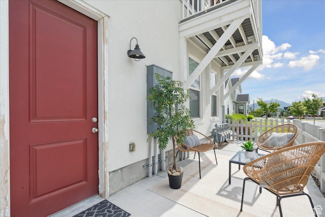 5504 W Burntside Ave, South Jordan, UT 84009 - doorway to property featuring stucco siding and a mountain view