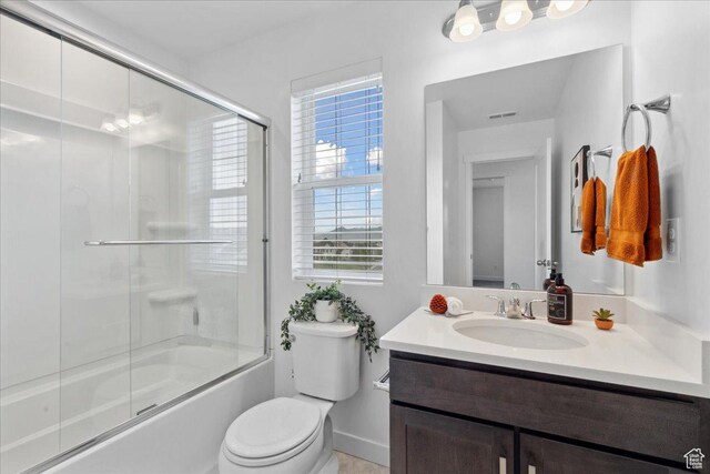 5504 W Burntside Ave, South Jordan, UT 84009 - full bathroom featuring vanity and shower / bath combination with glass door