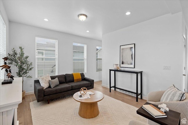 5504 W Burntside Ave, South Jordan, UT 84009 - living room with light wood finished floors and recessed lighting