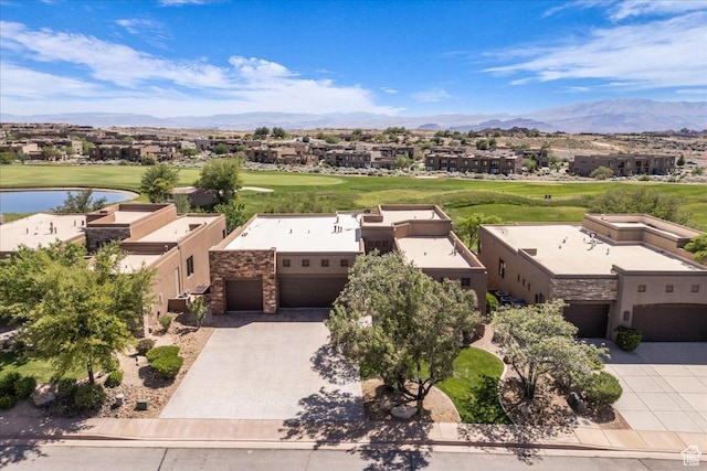 1683 W Red Cloud Dr, St George, UT 84770 - aerial view of residential area featuring a water and mountain view and a local golf course