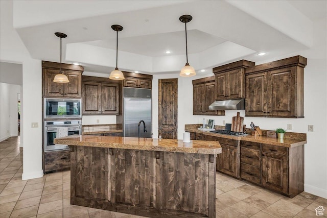 1683 W Red Cloud Dr, St George, UT 84770 - kitchen featuring built in appliances, under cabinet range hood, dark brown cabinets, light tile patterned floors, and recessed lighting