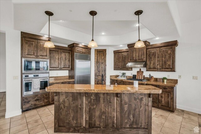 1683 W Red Cloud Dr, St George, UT 84770 - kitchen featuring built in appliances, under cabinet range hood, a kitchen island, dark brown cabinets, and recessed lighting