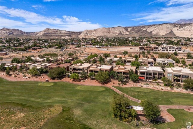 1683 W Red Cloud Dr, St George, UT 84770 - aerial perspective of suburban area with a golf course and a mountain backdrop