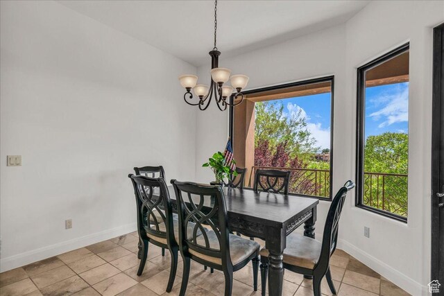 1683 W Red Cloud Dr, St George, UT 84770 - dining room with a chandelier and light tile patterned floors