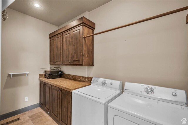 1683 W Red Cloud Dr, St George, UT 84770 - laundry area featuring cabinet space and washing machine and dryer
