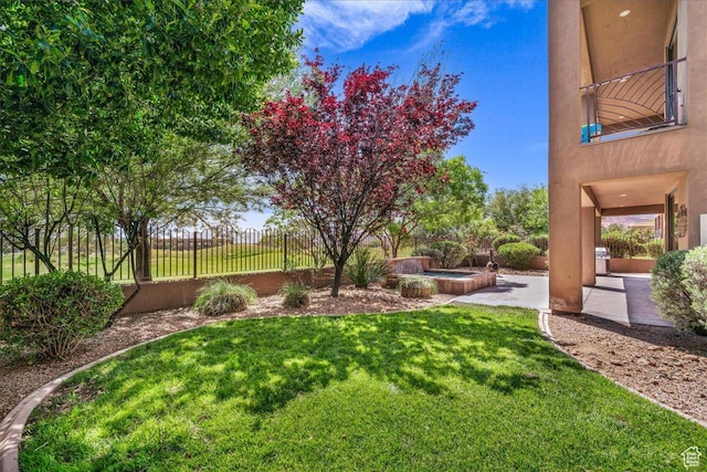 1683 W Red Cloud Dr, St George, UT 84770 - fenced backyard with a hot tub and a patio