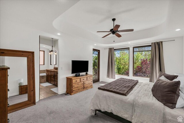 1683 W Red Cloud Dr, St George, UT 84770 - bedroom with carpet, recessed lighting, a raised ceiling, connected bathroom, and a ceiling fan