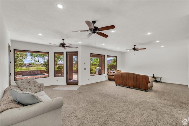 1683 W Red Cloud Dr, St George, UT 84770 - living area featuring recessed lighting, light colored carpet, and ceiling fan