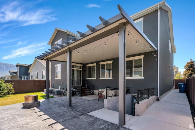 123 E 460 N, Vineyard, UT 84059 - back of property featuring stucco siding, a patio area, and entry steps