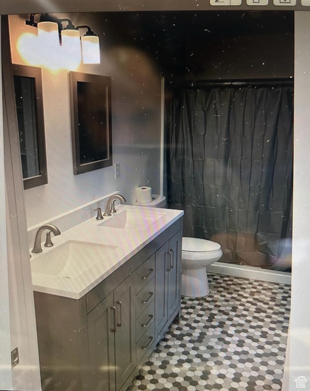 123 E 460 N, Vineyard, UT 84059 - full bathroom featuring double vanity, tile patterned floors, and a shower with shower curtain