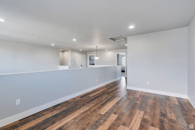 123 E 460 N, Vineyard, UT 84059 - spare room with attic access, dark wood-type flooring, and recessed lighting
