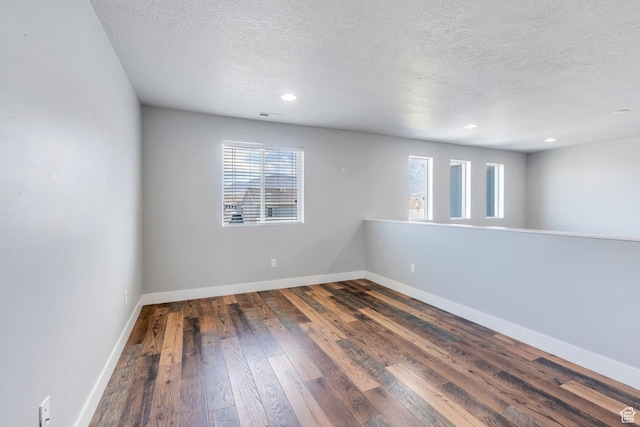 123 E 460 N, Vineyard, UT 84059 - empty room featuring a textured ceiling, hardwood / wood-style floors, and recessed lighting