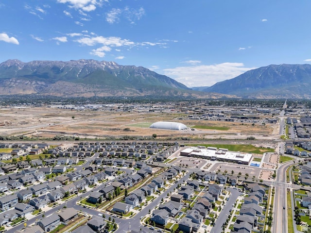 123 E 460 N, Vineyard, UT 84059 - aerial view of property and surrounding area with a mountainous background and nearby suburban area