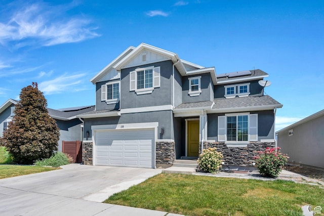 123 E 460 N, Vineyard, UT 84059 - view of front facade featuring stucco siding, solar panels, stone siding, and driveway