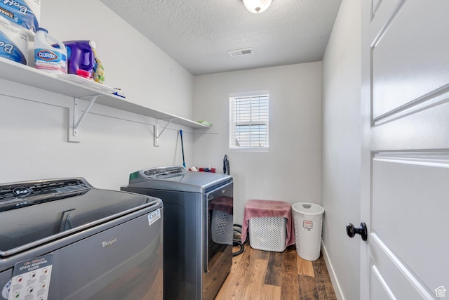 123 E 460 N, Vineyard, UT 84059 - washroom featuring washer and clothes dryer, wood finished floors, and a textured ceiling