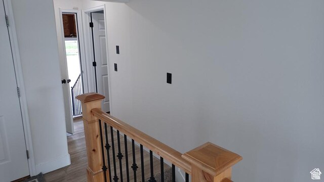 6116 W Graceland Way, West Jordan, UT 84081 - corridor featuring an upstairs landing and wood finished floors