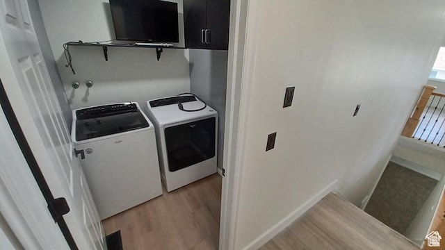6116 W Graceland Way, West Jordan, UT 84081 - laundry room featuring washing machine and dryer and light wood-type flooring
