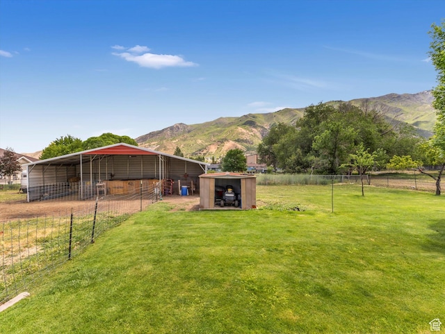 160 N 300 E, Santaquin, UT 84655 - view of yard featuring a mountain view, an outbuilding, and an exterior structure